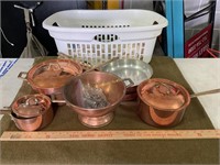 Copper pots some with lids, many different
