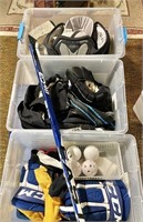 3 lidded totes of hockey gear