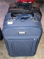 2 Carry-on Suitcases, brown and blue