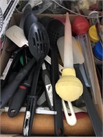 Two flats of kitchen utensils