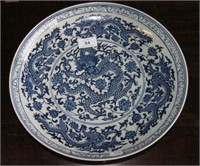 Blue & white dish decorated with dragons among