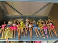 12 Barbie Dolls