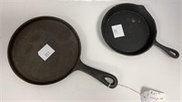 (2) small cast iron griddles