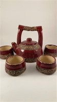 Earthenware teapot and cups
