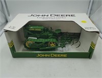 John Deere Lindeman crawler with cultivator