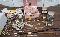Shoebox full jewelry with pink jewelry box
