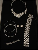 (1) Necklace (1) Earrings (2) Bracelet And (1) Pin