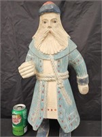 Hand carving wood Father Christmas.   Signed on
