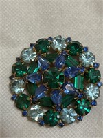 Vintage rhinestone brooch with green and 2 colors