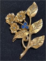 Vintage gold tone floral Brooch with blue