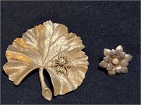 2 gold tone brooches