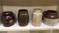 Four pottery pots, one bean pot with lid, one