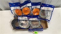 Grote lot of amber lamps, flanges, and gaskets