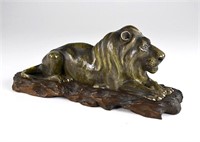 CHINESE EXPORT PORCELAIN RECLINING LION FIGURE