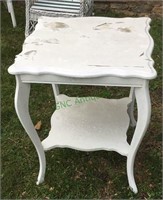 Table - white colored table for outdoor use.