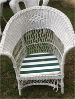 Lawn furniture - antique wicker high-back chair.