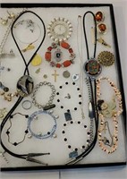 Case of jewelry incl bolo's, rosaries, etc