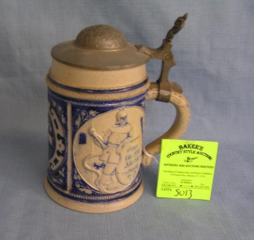 Early German beer stein with pewter lid