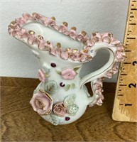 Ruffle edge porcelain pitcher