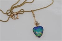 Good opal heart pendant on 9ct gold & diamond bale