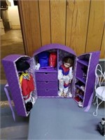 Doll wardrobe and doll. 17 in doll.
