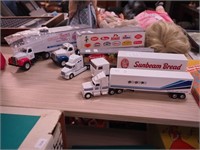 Five advertising senitrailer trucks: two 15"