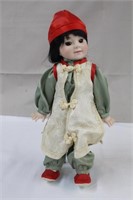Asian collector doll on stand with porcelain face,