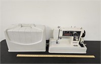 Vintage Dressmaker Sewing Machine In Carrying