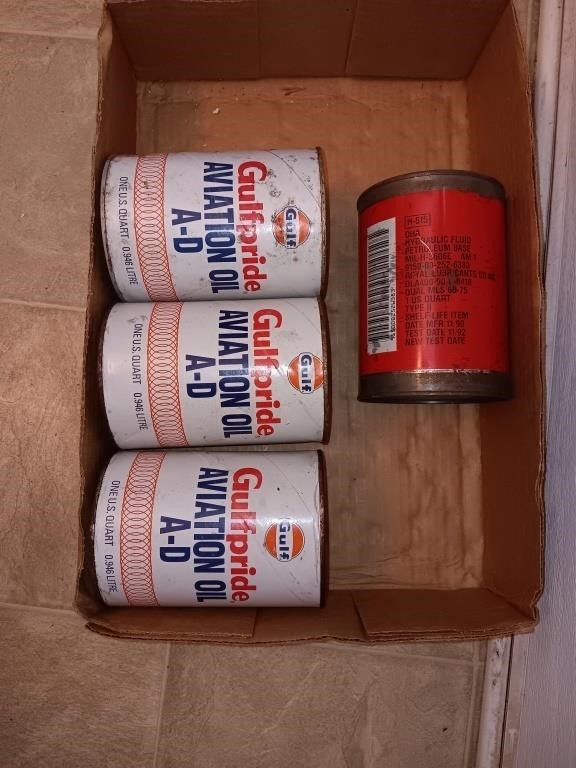 3 vintage Gulfpride gulf aviation oil cans full.