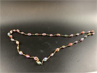Beautiful long necklace with hand made glass beads