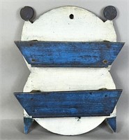 Primitive blue and white painted wall pocket ca.