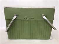 Vintage green cooler with metal handles