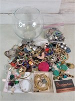 Fish Bowl Full of Jewelry Rings Bracelets