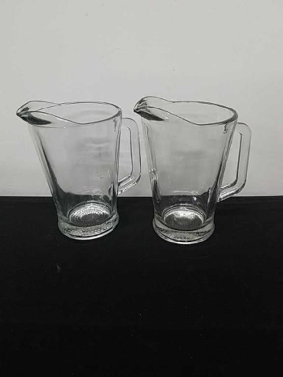 Two glass pitchers