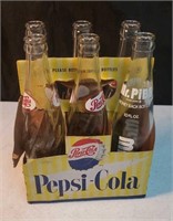 5 Pepsi-Cola bottles and a Mr Pibb's bottle