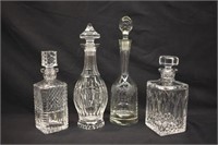 4 CRYSTAL DECANTERS - TALLEST IS 14.5"