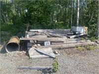 Pile in the woods #1 - Railroad ties, steel casing