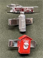 THREE FIREMAN TIE CLIPS (LONGEST IS 1.75in L)