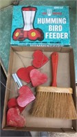 Hummingbird feeder in box plus brush and wood