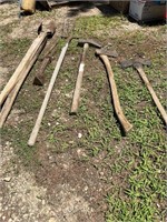 Axe, splitting maul, pitch fork, post hole digger