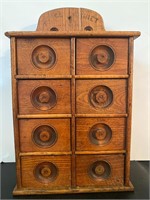 Antique wooden spice cabinet
