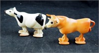 Two 50's Plastic Ramp Walking Toy Cows