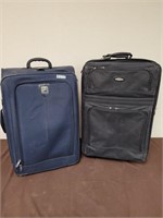 Two large suit cases