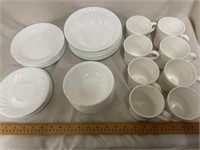 Set of bowls plates and coffee cups