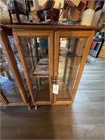 Lighted Cabinet w/Glass Shelves - Mathis Bros