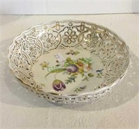 China bowl with open legs measuring 2 inches