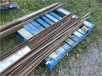 large assortment of steel rods. Square steel