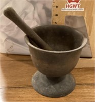 Huge cast-iron mortar and pestle