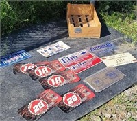 Advertising license plates and wooden crate