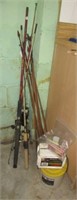 Lot of Vintage fishing poles, wood spears, lures,